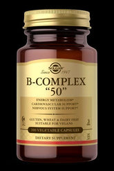 Solgar B-Complex 50 supplement in a brown bottle with gold label for energy and nerve support, 100 vegetable capsules.